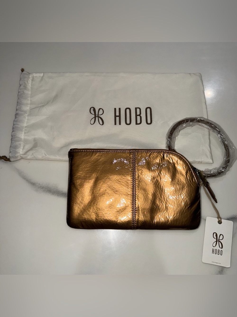 HOBO International Bronze Metallic Leather Wristlet Clutch Bangle Handle NWT